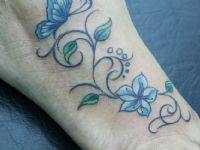 Flor-flower-mariposa-butterfly-filigrana-pie-color-colortattoo-tattoo-tatuaje-amor-de-madre-zamora