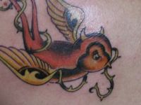 TATUAJE  PAJARO DEMONIO 