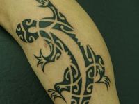 TATUAJE LAGARTO MAORI POLINESIO EN GEMELO I