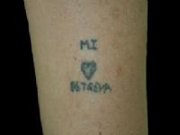 TATUAJE TAPADO LETRAS CON ROSA Y PUAL TRADICIONAL