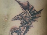 TATUAJE DRAGON EN VIENTRE