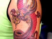 TATUAJE DRAGON COLOR BRAZO