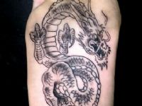 TATUAJE DRAGON PLANTA DEL PIE