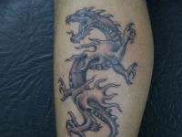 TATUAJE DRAGON PIERNA